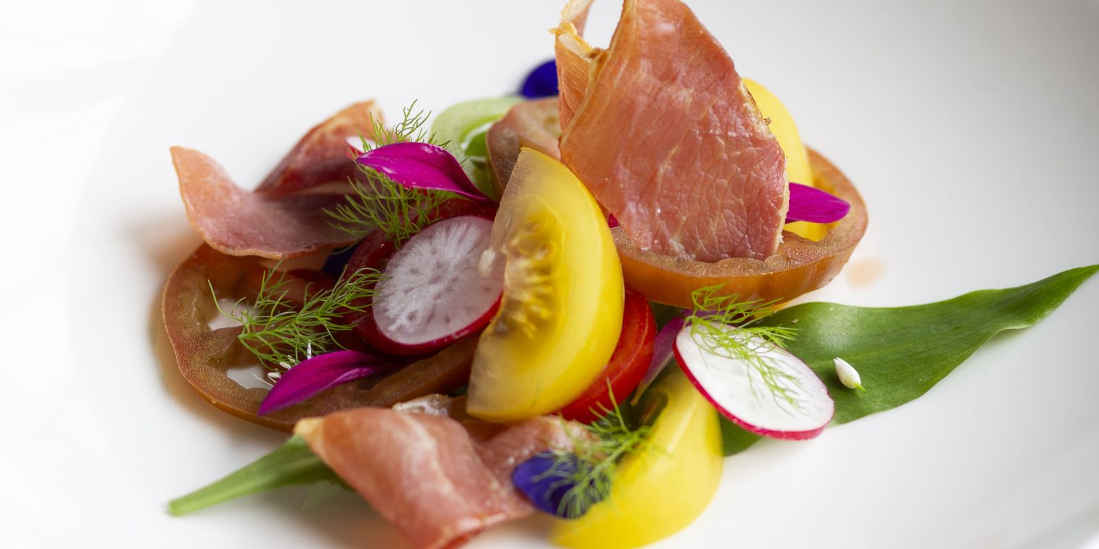 Heirloom tomato salad with Serrano ham