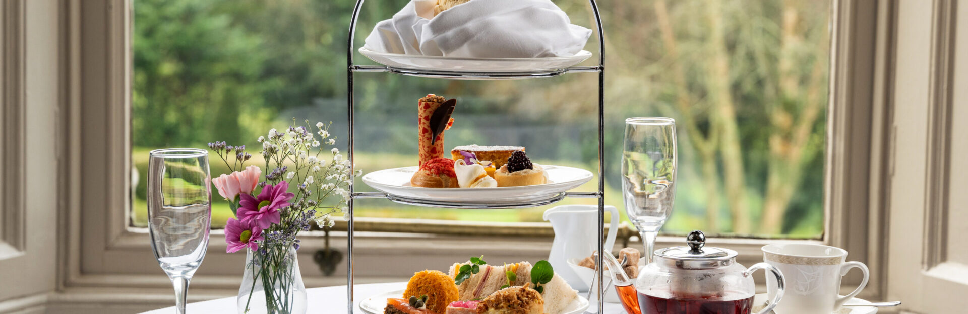 Afternoon Tea set up in window of Roseville Rooms Restaurant Faithlegg Faithlegg