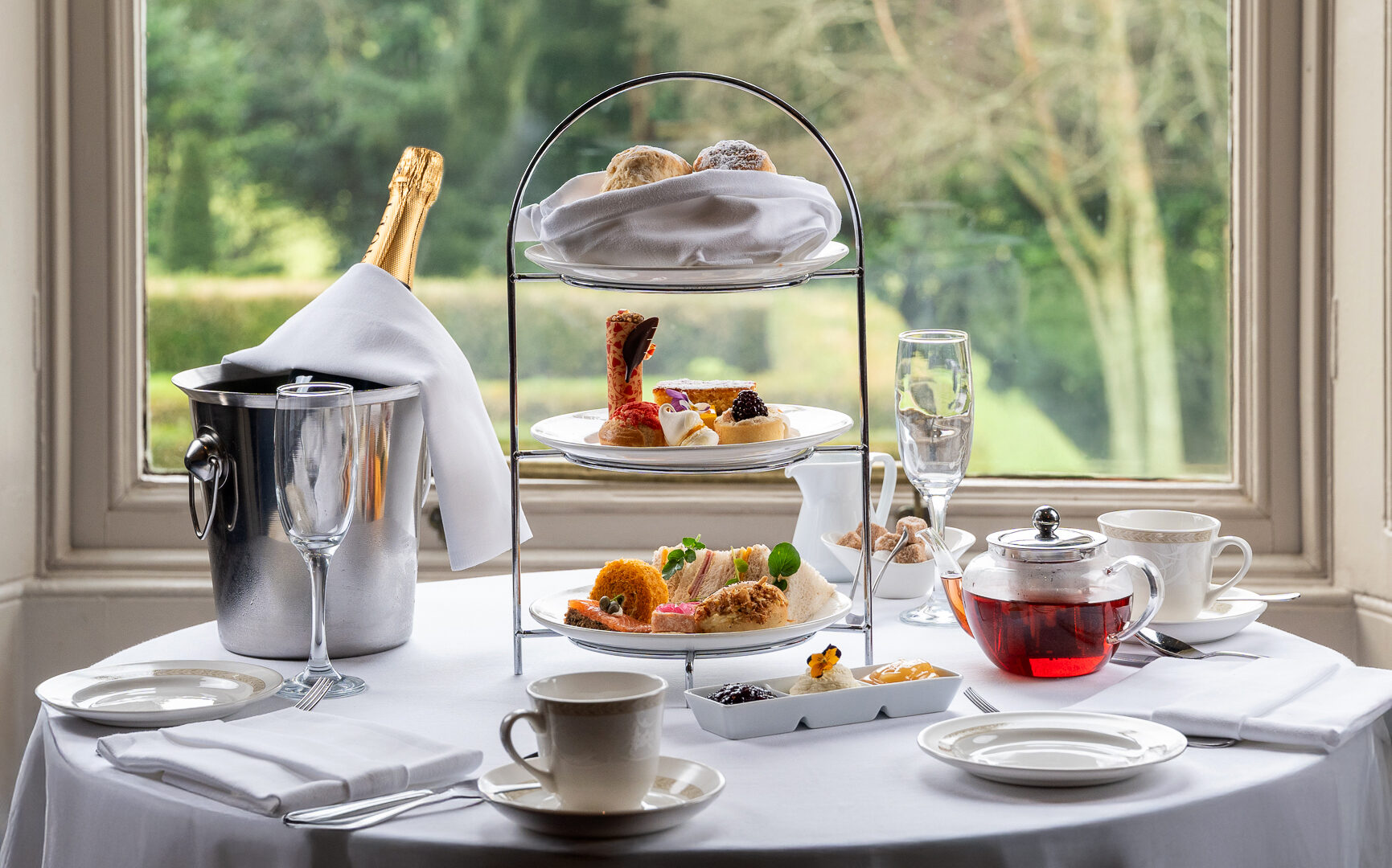 Afternoon Tea with champagne in window of Roseville Rooms Restaurant Faithlegg Faithlegg