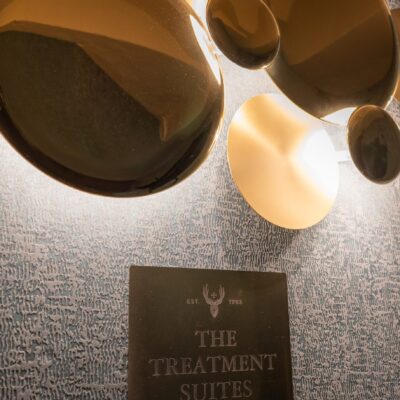 Light fitting with sign Treatment Suites Faithlegg